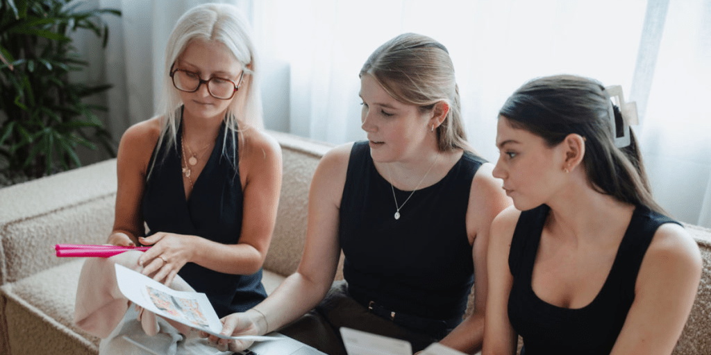 Pem, Millie and Carlie during the event planning process